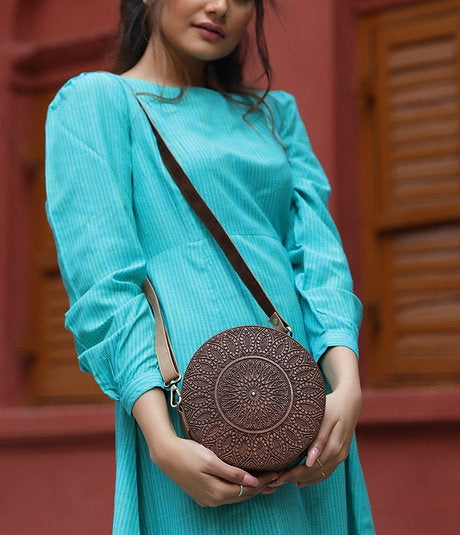 CARVED WOOD ROUND SLING BAG: Timeless Craft Meets Natural Elegance
