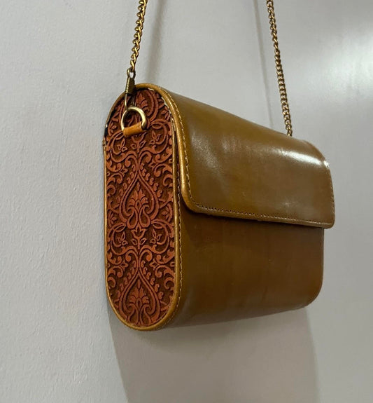 Handfinished carved wood and leather sling bag