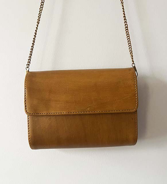 Handfinished carved wood and leather sling bag