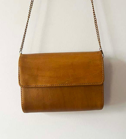 Handfinished carved wood and leather sling bag